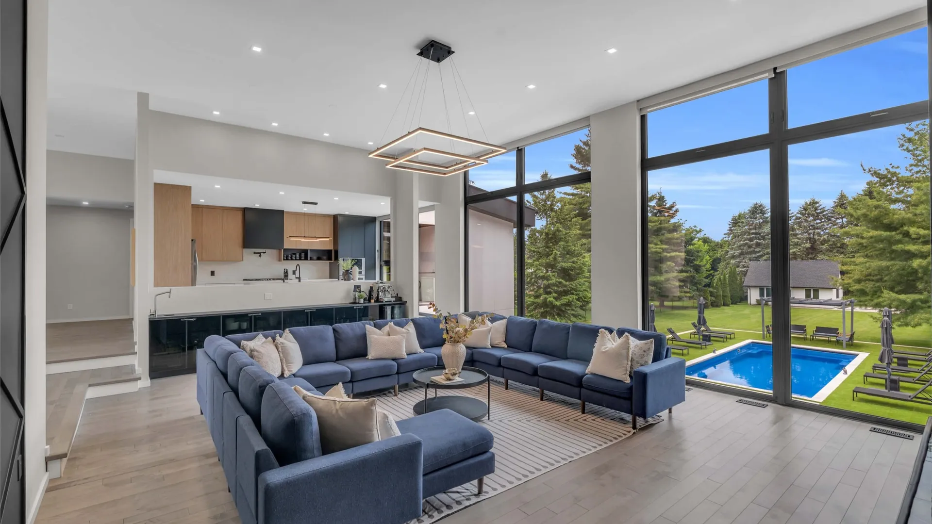 Sunlit Living Room with Pool View